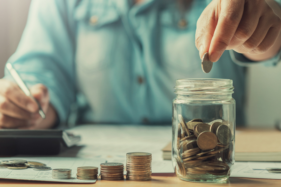 close up hand business women saving money. concept finance accounting in office